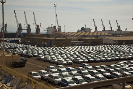 New cars lined up in the portの写真素材