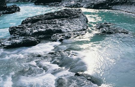 The mountain river with clean water. Photo.