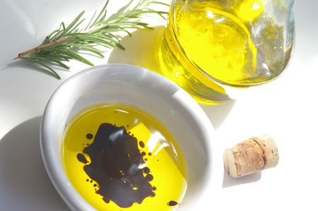 Olive oil with balsamic vinegar and rosemaryの写真素材