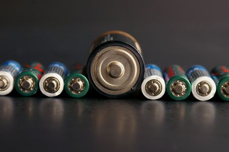 Assorted batteries with one large oneの写真素材