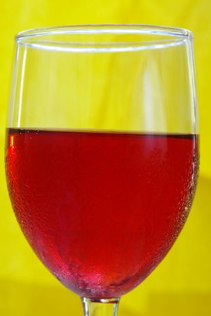 wine glass on yellowの写真素材