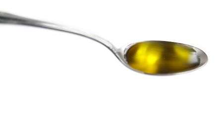  olive oil in whiteの写真素材