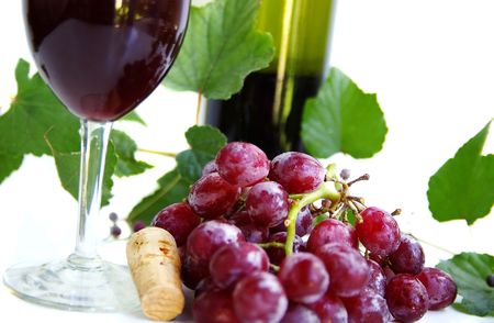 wine glass and cork and grapesの写真素材