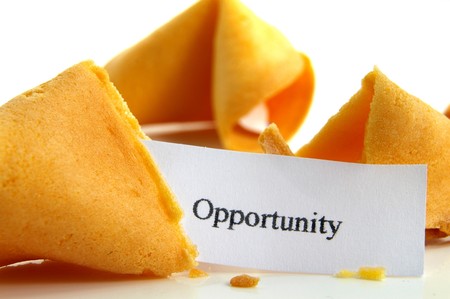 Opportunity fortune cookie, closeup on whiteの写真素材