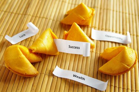 fortune cookies with opportunity, wealth, success messagesの写真素材