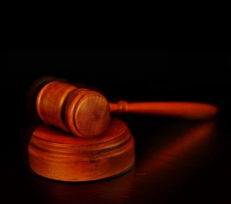 court gavel on a dark backgroundの写真素材