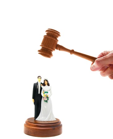 wedding couple figures and court gavel, on whiteの写真素材