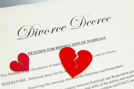 small broken red hearts on divorce papersの写真素材