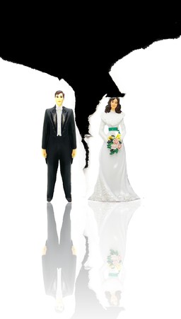 wedding couple figures and ripped paper (divorce concept)の写真素材