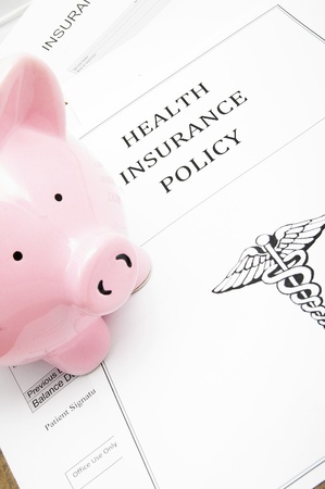 healthcare insurance and piggy bankの写真素材