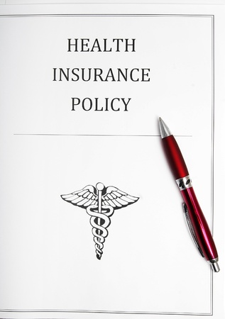 health insurance policy with penの写真素材