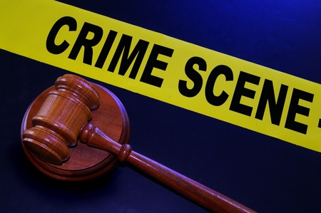 crime scene tape and legal gavelの写真素材