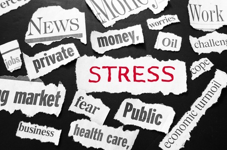 newspaper headlines showing bad news, stress in redの写真素材