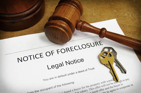 Foreclosure document with house keys and gavelの写真素材