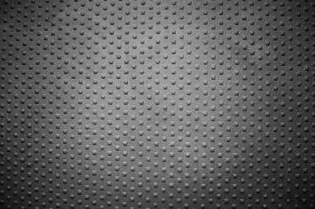 sheet of metal with round rivet patternの写真素材