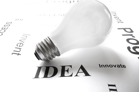 light bulb on white with business idea concept text                               の写真素材