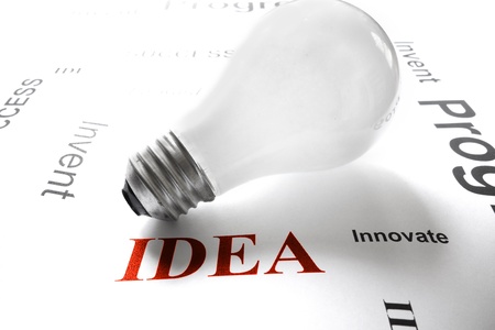 light bulb on white with business idea concept text                               の写真素材