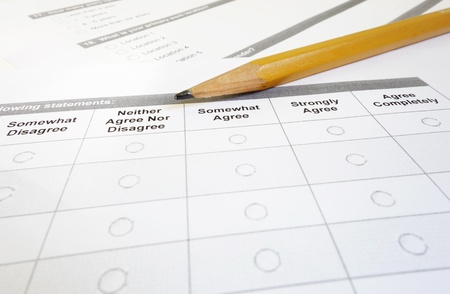 Closeup of a customer satisfaction survey and pencil                               の写真素材