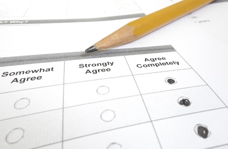  Closeup of a customer or employee survey with Agree Completely filled in                            の写真素材