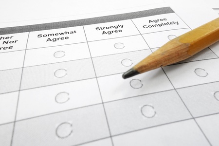closeup of a survey questionnaire form and pencil                               の写真素材
