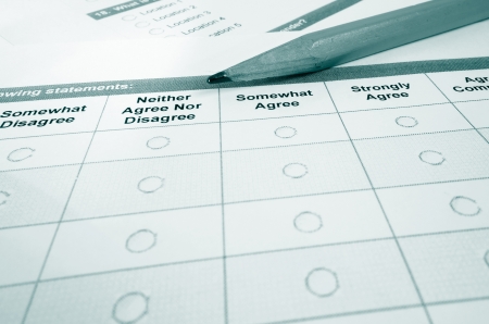 Closeup of a customer satisfaction survey and pencil                               の写真素材
