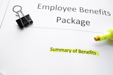 Employee Benefits Package forms and highlighter                               の写真素材