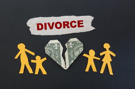 Paper family and broken money heart with Divorce textの写真素材