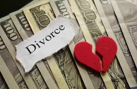 Broken red heart and Divorce paper note on cashの写真素材