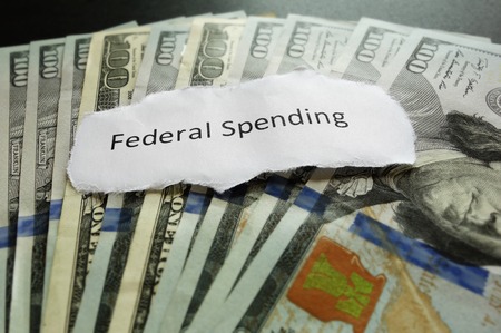 Federal Spending paper text on assorted cashの写真素材
