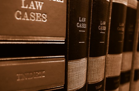 Law cases and law books on a shelfの写真素材