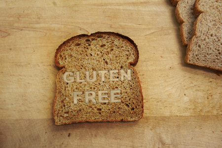 Slice of bread with Gluten Free labelの写真素材