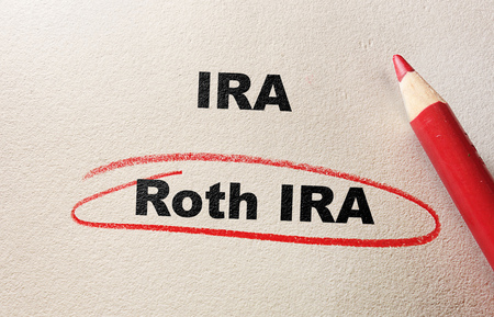 Roth IRA circled in red pencil, with IRA textの写真素材