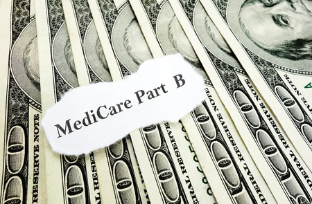 Newspaper Medicare Part B headline on moneyの写真素材
