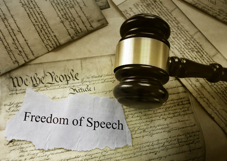 Freedom of Speech message on US Constitution with court gavel -- First Amendment conceptの写真素材