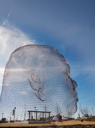 RALEIGH,NC/USA - 1-11-2019: Awilda & Irma steel sculpture by Spanish arist Jaume Plensa, one of many outdoor pieces of art at the North Carolina Museum of Art and sculpture garden in Raleigh NCのeditorial素材