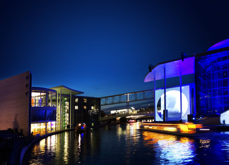 Berlin,Germany - 9-18-2017: The German Chancellery building and Spree River at duskのeditorial素材