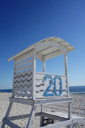 A lifeguard chair with the number 20 at Carolina Beach NCの写真素材