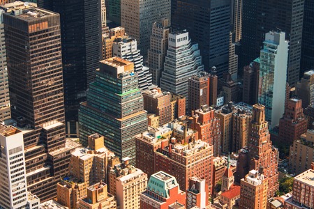 New York City Manhattan skyline aerial view with skyscrapers and street.