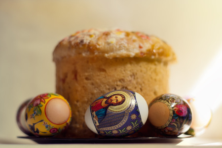 Easter cake and Easter eggs in the rays of dawn.の写真素材