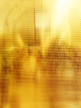 Abstract yellow background. Limited surface. Light and color. Fantasy. You can use for banners, posters.の写真素材