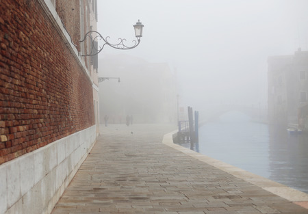 Fog in Venice near Arsenal and bridgeの写真素材