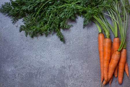 Carrots on the stone backgroundの写真素材