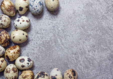 some eggs of quail on the stone backgroundの写真素材