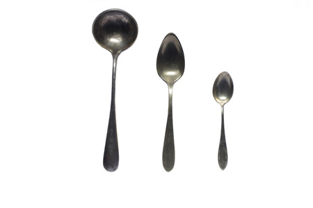 Antique cutlery (spoons and ladle). Isolatedの写真素材