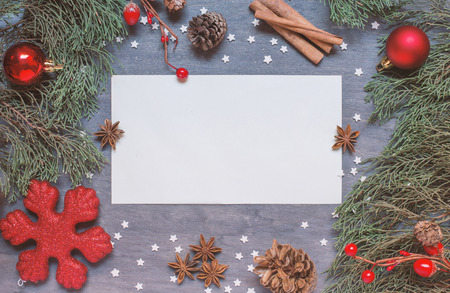 Christmas background with cone, anise tree, cinnamon, cooking cutter and stars from sugar