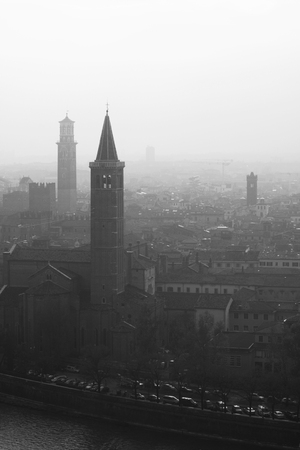 Top view of fog Verona city with towers, Italy. Soft focusの写真素材