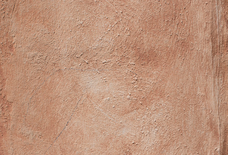 Red textured street wall in Rome, Italyの写真素材