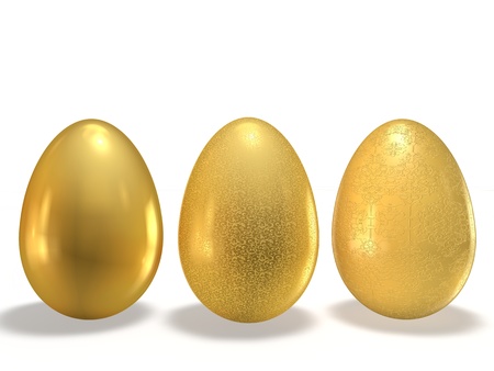 Golden eggs with the texture pattern on a white backgroundの写真素材
