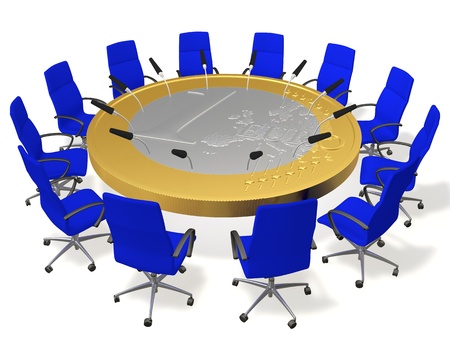 The table in the form of coins with the microphones and chairs aroundの写真素材