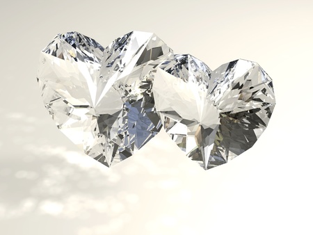 Pair of diamond hearts on a white backgroundの写真素材